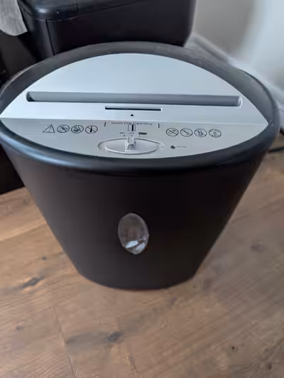 Paper shredder in good shape. It can also shred credit cards and CDs. If the ad is up it's still ava...