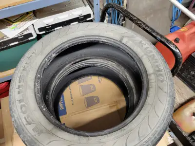 Moving sale. 2 tires. Good tread left. Easily pass safety or for a spare. Sold the car and forgot th...