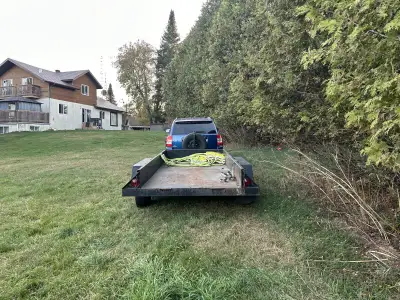 This sturdy used trailer is ready to haul your equipment or gear with ease. It features a solid stee...