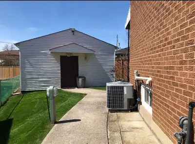 This is a basement room for rent featuring a kitchen, bathroom, and living space. Available for imme...