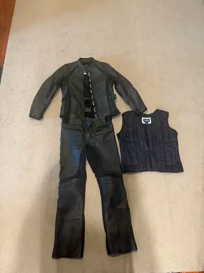 Selling a Triumph motorcycle riding jacket and pants set, offering great protection and style on the...
