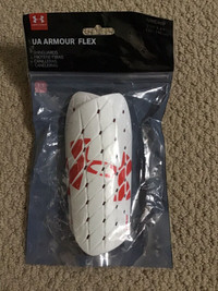 Brand new under armour shin guards 