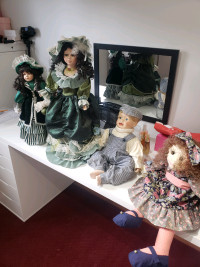 Porcelain dolls and chairs