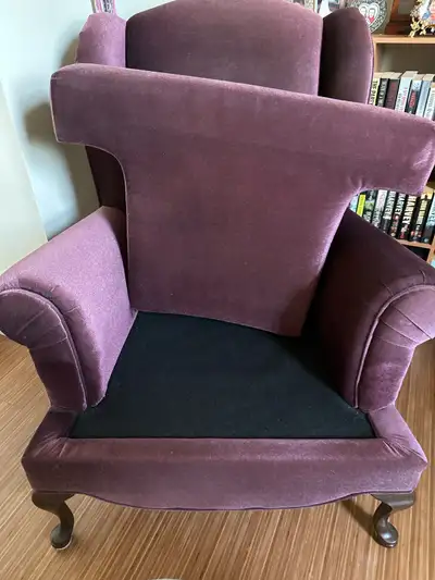 Plum coloured wing chair. Locally made very good condition. Like new