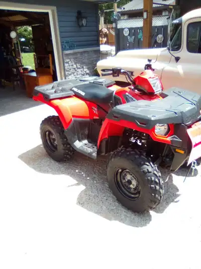 2012 Polaris Sportsman ATV 400. Excellent condition. Comes with a plow. 840 original miles. 1 owner....