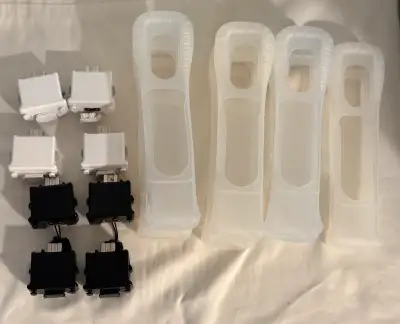 Selling Wii Motion Plus adapters I have 8 wii motion plus adapters with silicone sleeves. They are 1...