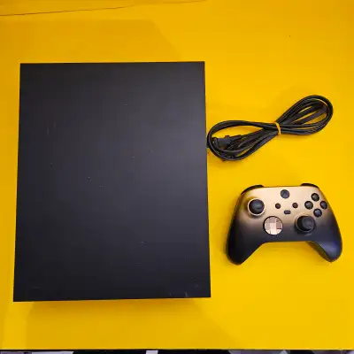 I'm selling this Xbox One X along with a gold controller. It includes the power cord. It's been test...