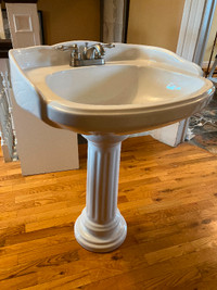 Pedestal Sink with brushed chrome faucet and water lines. ($50)