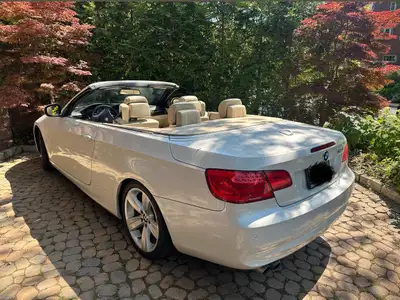 2011 BMW 328i Cabriolet, White with beige leather interior and a power retractable hardtop. This rea...