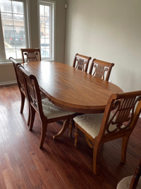 Solid wooden dining table and 6 chairs