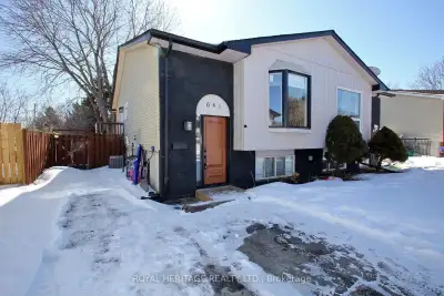 This semi-detached bungalow-raised house offers a completely modernized living experience near the H...