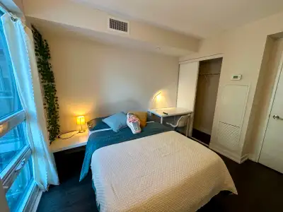 Hey guys! I'm renting out a private room in a modern condominium located in the heart of downtown To...