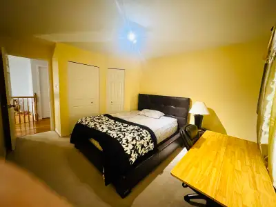 This spacious room rental includes all utilities and furnishings, making it a convenient and comfort...
