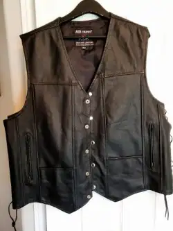 Never Used XXL fits like XL Never worn Nice Vest Four Pockets 2 which has Zipper