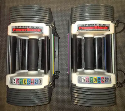 Dumbells powerblock réglable 5 a 50 lbs Tres solide , en metal Incassable comparable au "bowflex" Tr...