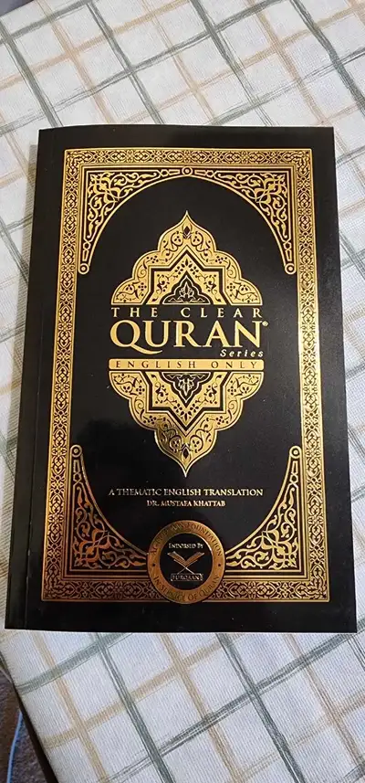 This listing is for The Clear Quran: A Thematic English Translation by Dr. Mustafa Khattab. Widely r...