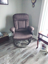 Rocking and swivel brown chair