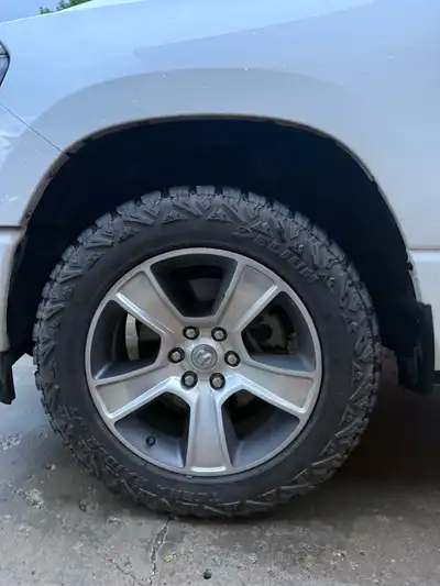 Selling a set of used Ram 1500 20-inch rims and tires, which came off a 2023 model. These wheels fea...