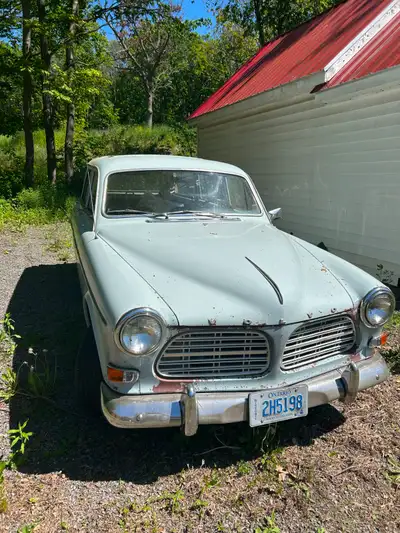 This 1967 Volvo 122S station wagon is finished in factory paint ivory white, engine is unrestored or...