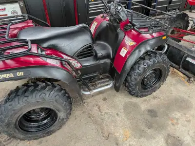 Great running traxter 500 AWD . Automatic with the option of electronic manual shift . Runs and driv...