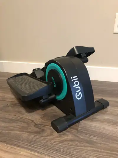 For sale is an under desk elliptical by Cubii (Brain Cubii), designed for quiet, low-impact movement...