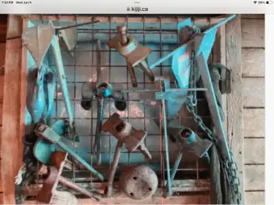 Selection of anchors $30 apiece also a 1 set of 7 foot oars $50 and one pair of canoe paddles $50