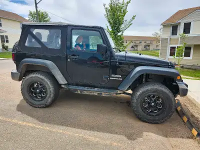 Don't let the year fool you! 2 door Manual, 2016 Jeep Wrangler Sport, lifted, soft top, 6 speed manu...