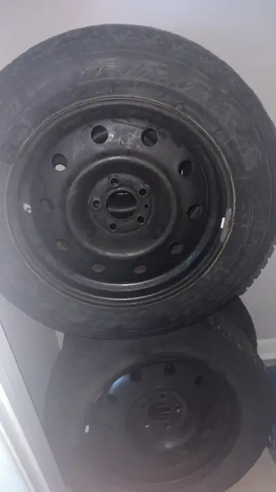 4winter tires Great Condition forge tires p215/65R17 98S with the rims as well!