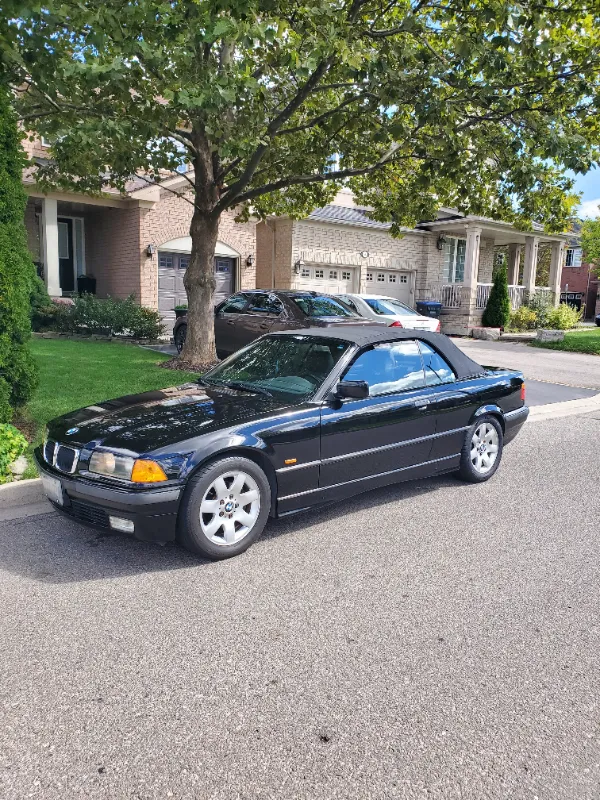 Black 1999 BMW 328I E36 convertible Ultimate driving machine