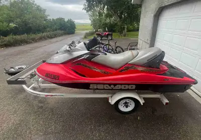 2003 Sea Doo GTX 4tec 160 hours runs excellent Will need a new seat cover Comes with 2/place trailer...