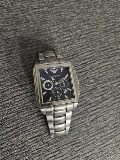 Emporio Armani Mens Watch . Good condition. Needs new battery. A few links have been removed. Model...