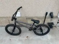 BMX, two mountain bikes and two scooters