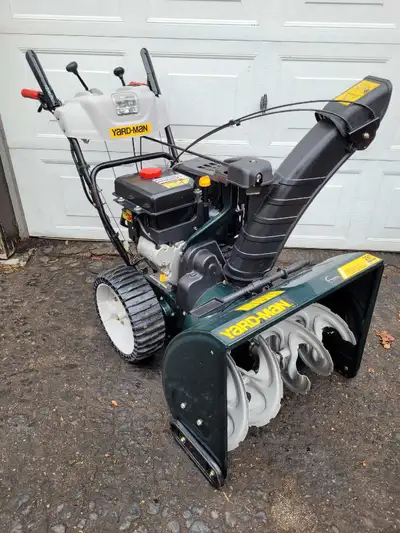 Yard-man(MTD) 26" snowblower still in new condition. 277cc(9hp) engine with electric start and new o...