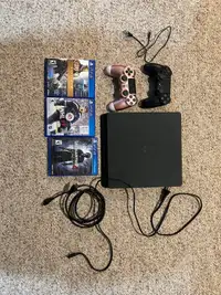 PS4 slim 2 controllers and games 