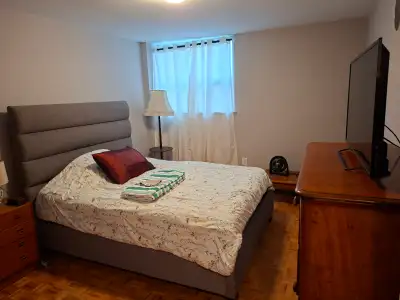 Still Available! Spacious furnished room with Queen size bed and TV in a newly-renovated apartment n...