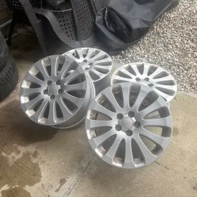 4 used alloy rims ~~ 15 in bolt5×100 good condition From Subaru Impreza