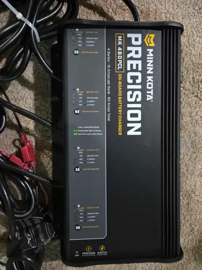 I'm selling a New Minn Kota MK 460PCL Precision on-board battery charger, designed to efficiently ch...