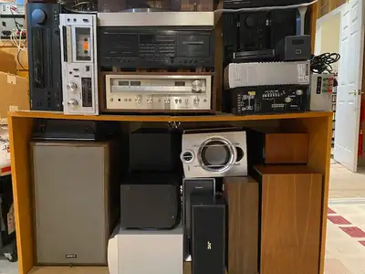 A collection of stereo equipment- Speakers and various equipment, View more