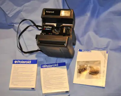 Polaroid Camera and Film.....$25, View more