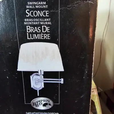 Have one brushed nickel swing arm wall mount sconce. $35