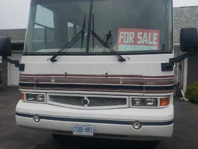 This is a 35 foot motorhome powered by a Ford 7.5l engine . It has the most beautiful layout with lo...