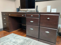 Solid brown wood executive desk and file cabinet