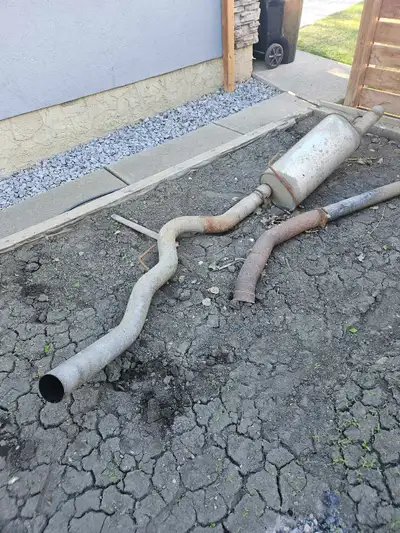 Stock 3rd gen Dodge Cummins exhaust system with muffler, brackets and clamps. Came off a 2004 Dodge...