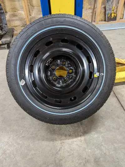 225-60-16 wheel and tire from 2005 Grand Marquis new condition never used