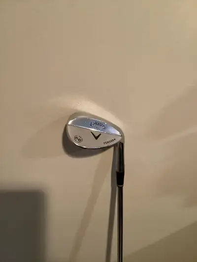 Wedge is in excellent condition and has new midsized grip