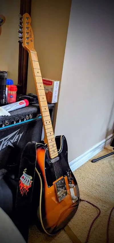 Warmoth neck has a 10" to 16" compound radius, a fine tune truss rod system(see pic), and plays like...