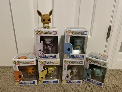 6 pokemon Pops never taken out of box. (Charmander, Mewtwo, Pichu, Squirtle, Cubone, Bulbasaur) 1 Ee...
