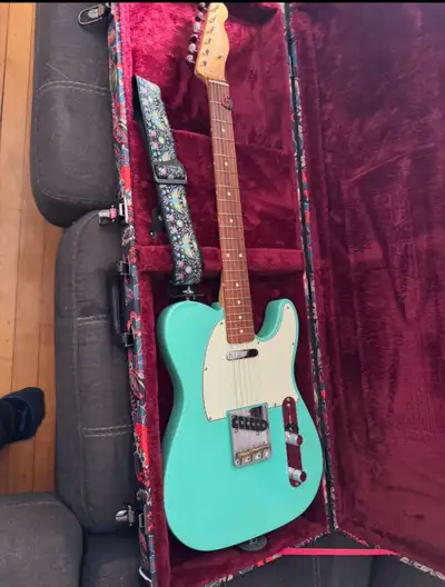 Selling my Fender Vintera Telecaster in seafoam green. Comes with paisley case. Looking to get $1000...