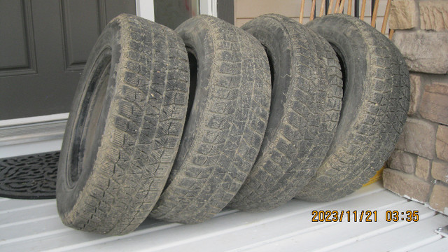 4 Bridgestone Blizzak winter tires, 15 inch on rims in Tires & Rims in Lethbridge