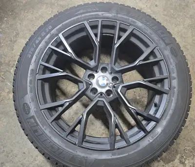 A set of four winter tires with rims, size 275/45R20, has 40-50% tread life remaining. The bolt patt...